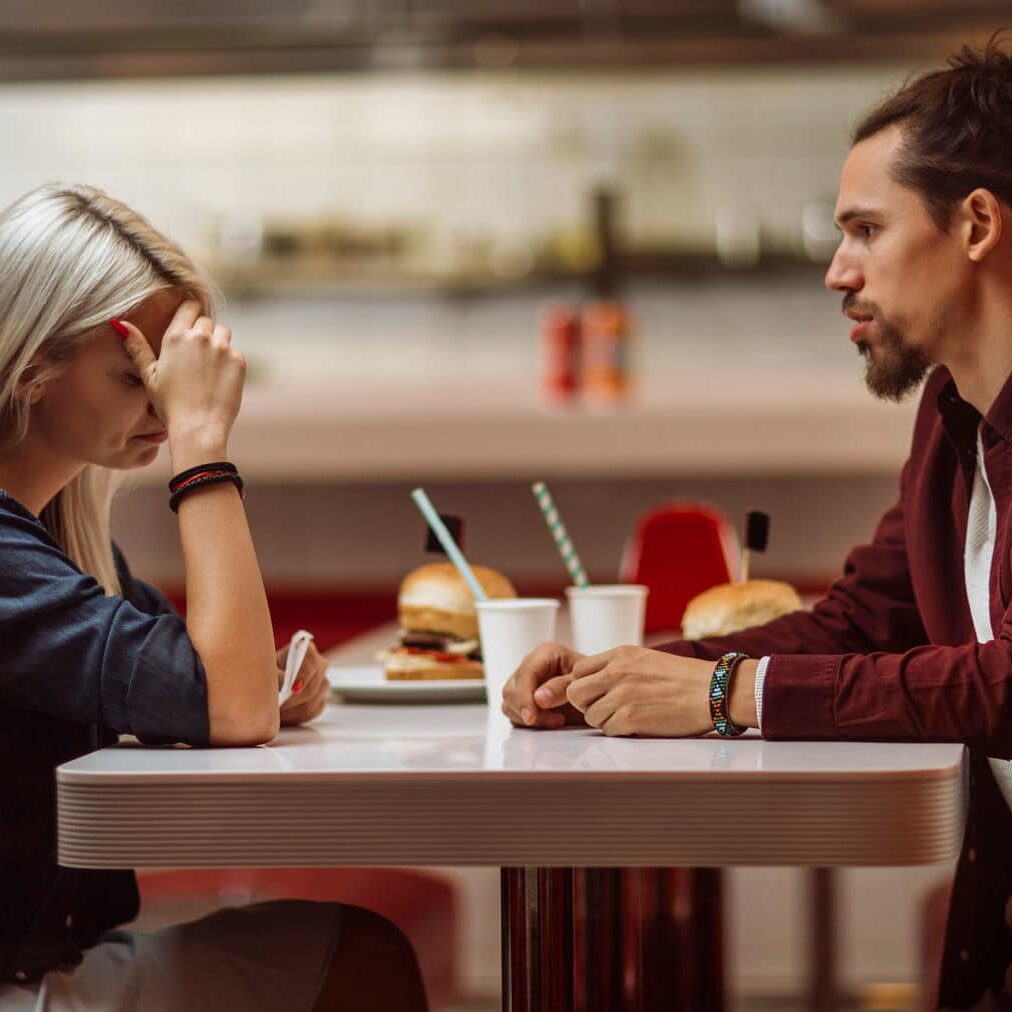 man and woman on date